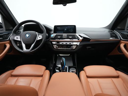 BMW iX3 High Executive 80 kWh 285pk Panorama Navigatie Trekhaak Stoelverwarming 115 ActivLease financial lease