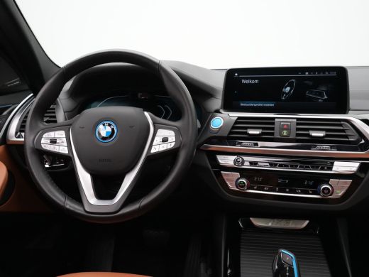 BMW iX3 High Executive 80 kWh 285pk Panorama Navigatie Trekhaak Stoelverwarming 115 ActivLease financial lease