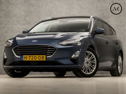 Ford FOCUS Wagon 1.0 EcoBoost Titanium Business Automaat (PANORAMADAK, APPLE CARPLAY, GROOT NAVI, STUUR/STOELVERWA... Ford FOCUS Wagon 1.0 EcoBoost Titanium Business Automaat (PANORAMADAK, APPLE CARPLAY, GROOT NAVI, STUUR/STOELVERWA...
