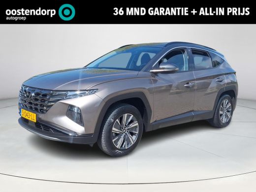 Hyundai Tucson 1.6 T-GDI HEV Comfort Smart | Rijklaarprijs! | Trekhaak 1.650kg! | Climate Control 3 zone | Adapt... Hyundai Tucson 1.6 T-GDI HEV Comfort Smart | Rijklaarprijs! | Trekhaak 1.650kg! | Climate Control 3 zone | Adapt...