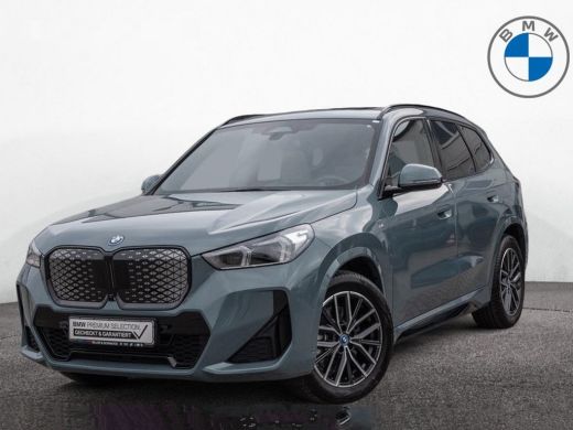 BMW iX1 xDrive30 (67 kWh) M-SPORT ** LED, BEIGE LEDER, PANORAMA, TREKH, ACC, HiFi, 20-inch LMV ** 24k ond... ActivLease financial lease