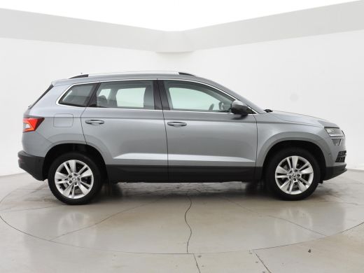 Skoda Karoq 1.5 TSI ACT 150 PK AUT. + VIRTUAL COCKPIT | ADAPTIVE CRUISE | TREKHAAK | STUURVERWARMING ActivLease financial lease