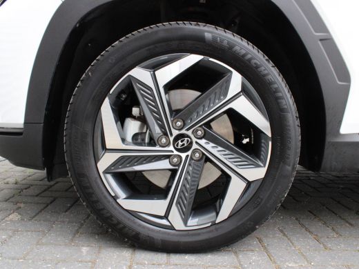 Hyundai Tucson Hyundai 1.6 T-GDI PHEV Comfort Smart 4WD | Buitenspiegels elektrisch inklapbaar | Navigatiesystee... ActivLease financial lease