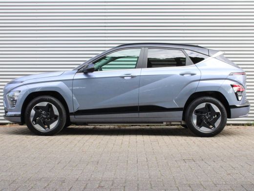 Hyundai KONA Electric Comfort Smart 65.4 kWh | Cruise control adaptief met Stop&Go en stuurhulp | Dodehoekdetectie met ... ActivLease financial lease