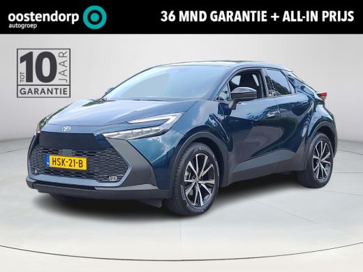 Toyota C-HR 1.8 Hybrid 140 First Edition | Apple CarPlay | Elektr. klep | Stoel/stuurverwarming | Rijklaarpri... Toyota C-HR 1.8 Hybrid 140 First Edition | Apple CarPlay | Elektr. klep | Stoel/stuurverwarming | Rijklaarpri...