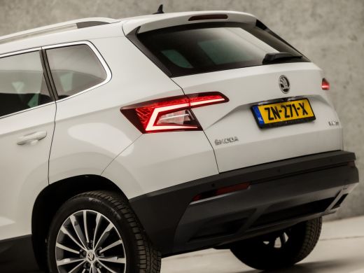 Skoda Karoq 1.0 TSI Sport Deluxe Automaat (APPLE CARPLAY, GROOT NAVI, CAMERA, LEDER/ALCANTARA, STOELVERWARMIN... ActivLease financial lease