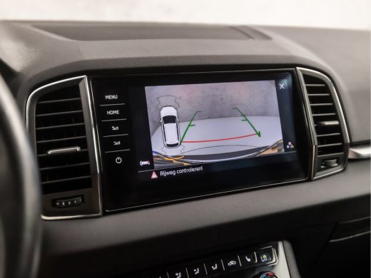 Skoda Karoq 1.0 TSI Sport Deluxe Automaat (APPLE CARPLAY, GROOT NAVI, CAMERA, LEDER/ALCANTARA, STOELVERWARMIN... ActivLease financial lease