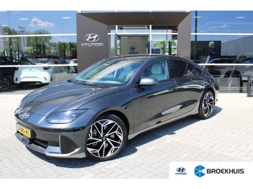Hyundai IONIQ 6 Lounge 77.4 kWh | Wit interieur | Weinig kilometers | 360 graden camera | Elektrisch bedienbare v... Hyundai IONIQ 6 Lounge 77.4 kWh | Wit interieur | Weinig kilometers | 360 graden camera | Elektrisch bedienbare v...