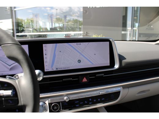 Hyundai IONIQ 6 Lounge 77.4 kWh | Wit interieur | Weinig kilometers | 360 graden camera | Elektrisch bedienbare v... ActivLease financial lease