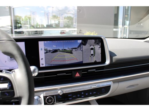 Hyundai IONIQ 6 Lounge 77.4 kWh | Wit interieur | Weinig kilometers | 360 graden camera | Elektrisch bedienbare v... ActivLease financial lease