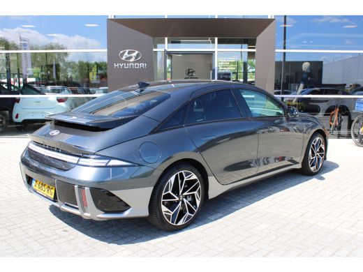 Hyundai IONIQ 6 Lounge 77.4 kWh | Wit interieur | Weinig kilometers | 360 graden camera | Elektrisch bedienbare v... ActivLease financial lease