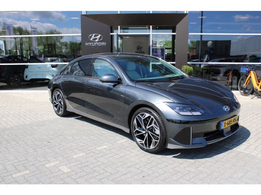 Hyundai IONIQ 6 Lounge 77.4 kWh | Wit interieur | Weinig kilometers | 360 graden camera | Elektrisch bedienbare v... ActivLease financial lease