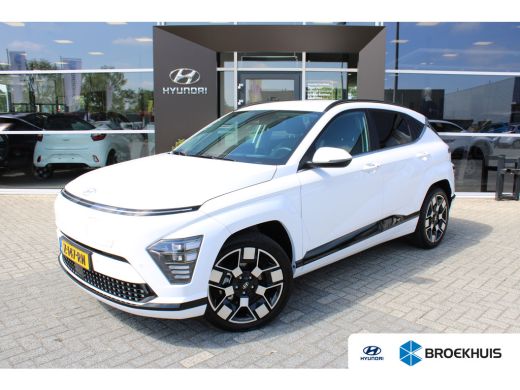 Hyundai KONA Electric Comfort Smart 65.4 kWh | Stoelbekleding, stof | Achteruitrijcamera | Parkeersensoren achter | Sto... Hyundai KONA Electric Comfort Smart 65.4 kWh | Stoelbekleding, stof | Achteruitrijcamera | Parkeersensoren achter | Sto...