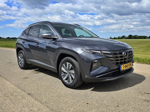 Hyundai Tucson Hybrid 1.6 T-GDI HEV Comfort Smart - 180 Pk - Euro 6 - ParkeerCamera - StoelVerwarming ActivLease financial lease
