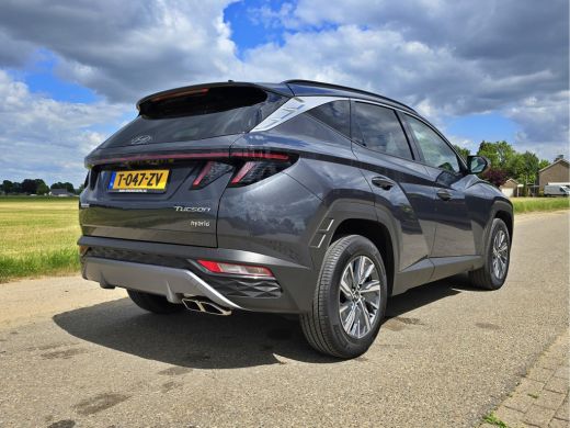 Hyundai Tucson Hybrid 1.6 T-GDI HEV Comfort Smart - 180 Pk - Euro 6 - ParkeerCamera - StoelVerwarming ActivLease financial lease