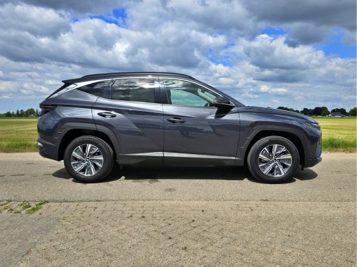 Hyundai Tucson Hybrid 1.6 T-GDI HEV Comfort Smart - 180 Pk - Euro 6 - ParkeerCamera - StoelVerwarming ActivLease financial lease