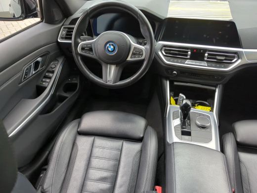 BMW 3 Serie Touring 320e Business Edition Plus NL AUTO | LEDER | STOELVERW | CARPLAY | ActivLease financial lease