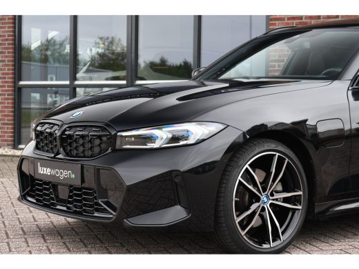 BMW 3 Serie Touring 330e xDrive M-Sport Pano ACC H/K 360 HUD El-zetel 19inch ActivLease financial lease