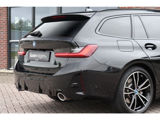 BMW 3 Serie Touring 330e xDrive M-Sport Pano ACC H/K 360 HUD El-zetel 19inch ActivLease financial lease