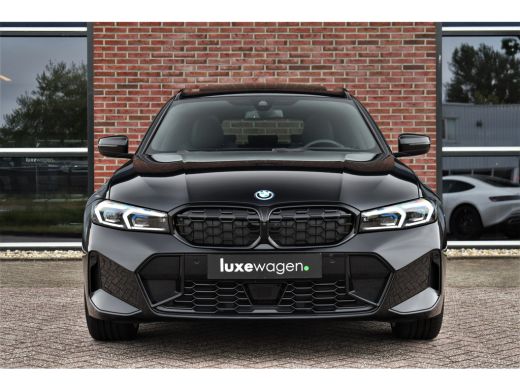 BMW 3 Serie Touring 330e xDrive M-Sport Pano ACC H/K 360 HUD El-zetel 19inch ActivLease financial lease