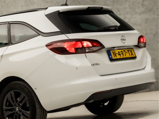 Opel Astra Sports Tourer 1.2 Design & Tech (APPLE CARPLAY, NAVIGATIE, CAMERA, CLIMATE, GITINT GLAS, LEDER, S... ActivLease financial lease