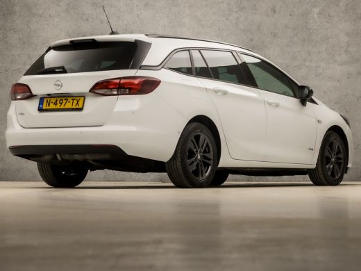 Opel Astra Sports Tourer 1.2 Design & Tech (APPLE CARPLAY, NAVIGATIE, CAMERA, CLIMATE, GITINT GLAS, LEDER, S... ActivLease financial lease