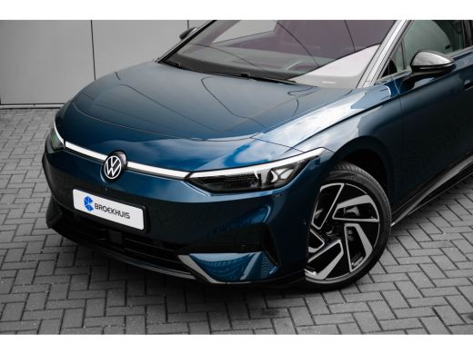 Volkswagen ID.7 Tourer Pro Business | Achterbank in ongelijke delen neerklapbaar incl. middenarmsteun en doorlaadmogelij... ActivLease financial lease