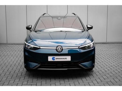 Volkswagen ID.7 Tourer Pro Business | Achterbank in ongelijke delen neerklapbaar incl. middenarmsteun en doorlaadmogelij... ActivLease financial lease