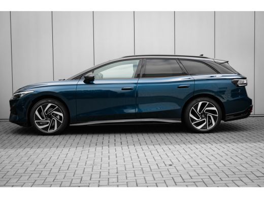 Volkswagen ID.7 Tourer Pro Business | Achterbank in ongelijke delen neerklapbaar incl. middenarmsteun en doorlaadmogelij... ActivLease financial lease