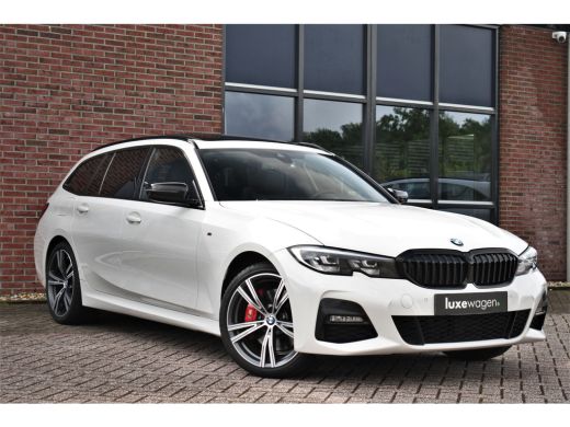 BMW 3 Serie Touring 330e M-Sport Pano Trekhaak Harman/K 19inch Camera ActivLease financial lease