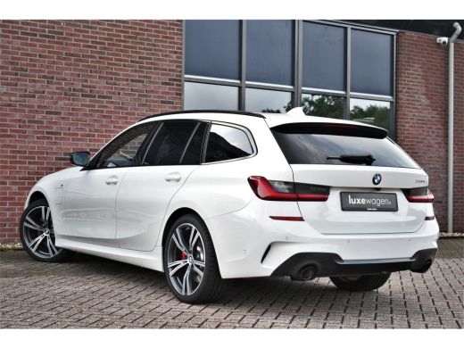 BMW 3 Serie Touring 330e M-Sport Pano Trekhaak Harman/K 19inch Camera ActivLease financial lease