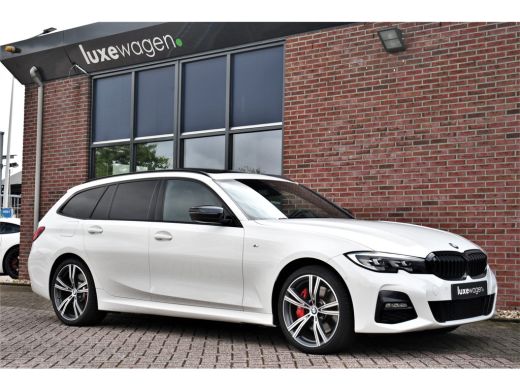 BMW 3 Serie Touring 330e M-Sport Pano Trekhaak Harman/K 19inch Camera ActivLease financial lease