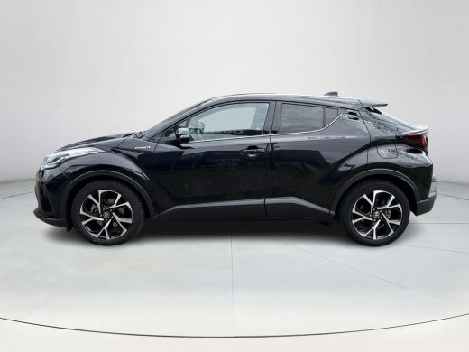 Toyota C-HR 1.8 Hybrid First Edition **NAVIGATIE/ DODEHOEK DETECTIE/ STOELVERWARMING/ GARANTIE** ActivLease financial lease