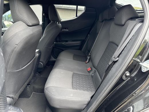 Toyota C-HR 1.8 Hybrid First Edition **NAVIGATIE/ DODEHOEK DETECTIE/ STOELVERWARMING/ GARANTIE** ActivLease financial lease