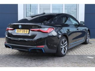 BMW i4 eDrive40 84 kWh | Adaptieve Cruise | 360' Camera | Stoel+Stuurverwarming | Elektr. klep | Navi | ...