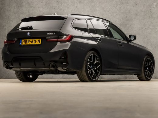 BMW 3 Serie Touring 330e M-Sport 293Pk Automaat (DRAVITGRAU, FACELIFT, LASER KOPLAMPEN, HEAD-UP DISPLAY, CAME... ActivLease financial lease
