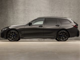 BMW 3 Serie Touring 330e M-Sport 293Pk Automaat (DRAVITGRAU, FACELIFT, LASER KOPLAMPEN, HEAD-UP DISPLAY, CAME...