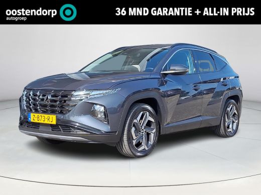 Hyundai Tucson 1.6 T-GDI PHEV Comfort Smart 4WD | Achteruitrijcamera | Apple Carplay/Android Auto | Stoel/stuurv... Hyundai Tucson 1.6 T-GDI PHEV Comfort Smart 4WD | Achteruitrijcamera | Apple Carplay/Android Auto | Stoel/stuurv...