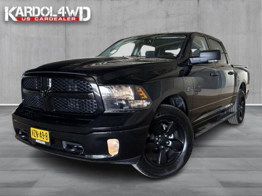 Dodge Ram 1500 1500 5.7 V8 4x4 Crew Cab | Tonneau cover in carroseriekleur| Trekhaak 13-polig| LPG | Geheel rijk... Dodge Ram 1500 1500 5.7 V8 4x4 Crew Cab | Tonneau cover in carroseriekleur| Trekhaak 13-polig| LPG | Geheel rijk...