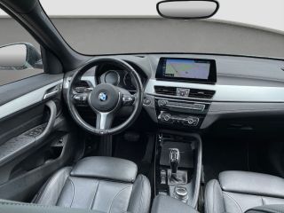 BMW X1 sDrive20i High Executive Sportline | Panoramadak | Trekhaak | Leder | Camera