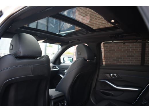 BMW 3 Serie Touring 330e M-Sport Pano ACC El-zetel HUD 19inch Camera Adp-onderstel ActivLease financial lease