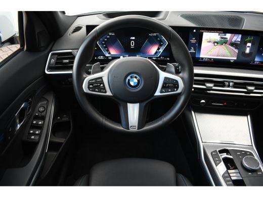 BMW 3 Serie Touring 330e M-Sport Pano ACC El-zetel HUD 19inch Camera Adp-onderstel ActivLease financial lease
