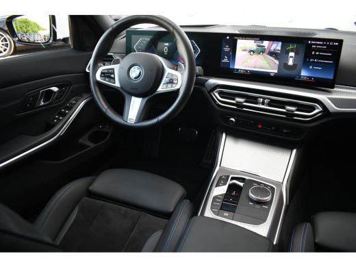 BMW 3 Serie Touring 330e M-Sport Pano ACC El-zetel HUD 19inch Camera Adp-onderstel ActivLease financial lease