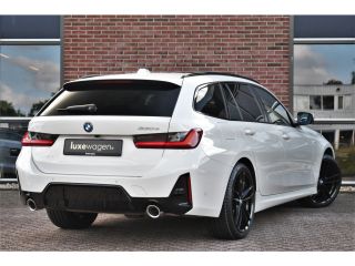 BMW 3 Serie Touring 330e M-Sport Pano ACC El-zetel HUD 19inch Camera Adp-onderstel