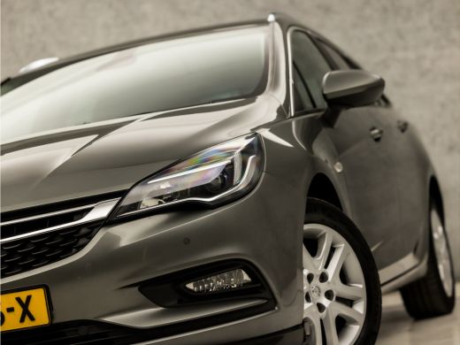 Opel Astra Sports Tourer 1.0 Sportline (APPLE CARPLAY, GROOT NAVI, GETINT GLAS, CHROOM PAKKET, XENON, SPORTS... ActivLease financial lease
