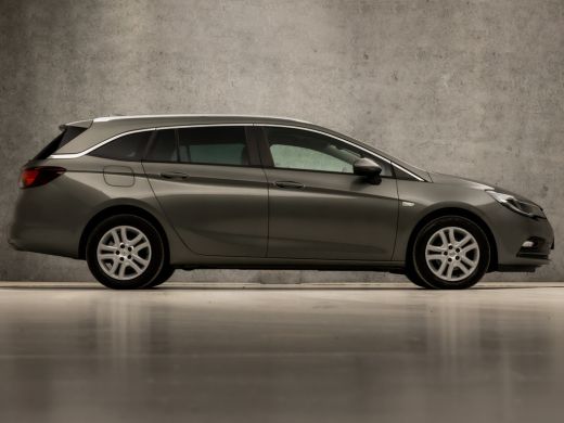 Opel Astra Sports Tourer 1.0 Sportline (APPLE CARPLAY, GROOT NAVI, GETINT GLAS, CHROOM PAKKET, XENON, SPORTS... ActivLease financial lease