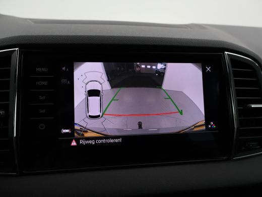 Skoda Karoq 1.5 TSI ACT 150 PK DSG AUT. SPORTLINE STEEL GREY + VIRTUAL COCKPIT | TREKHAAK | CAMERA | ADAPTIVE... ActivLease financial lease