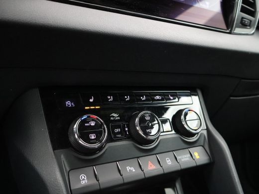 Skoda Karoq 1.5 TSI ACT 150 PK DSG AUT. SPORTLINE STEEL GREY + VIRTUAL COCKPIT | TREKHAAK | CAMERA | ADAPTIVE... ActivLease financial lease