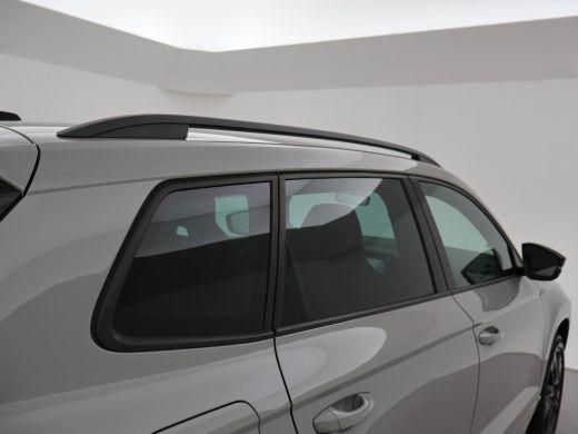 Skoda Karoq 1.5 TSI ACT 150 PK DSG AUT. SPORTLINE STEEL GREY + VIRTUAL COCKPIT | TREKHAAK | CAMERA | ADAPTIVE... ActivLease financial lease