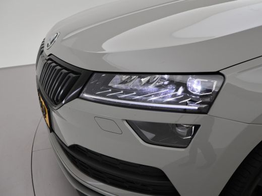 Skoda Karoq 1.5 TSI ACT 150 PK DSG AUT. SPORTLINE STEEL GREY + VIRTUAL COCKPIT | TREKHAAK | CAMERA | ADAPTIVE... ActivLease financial lease